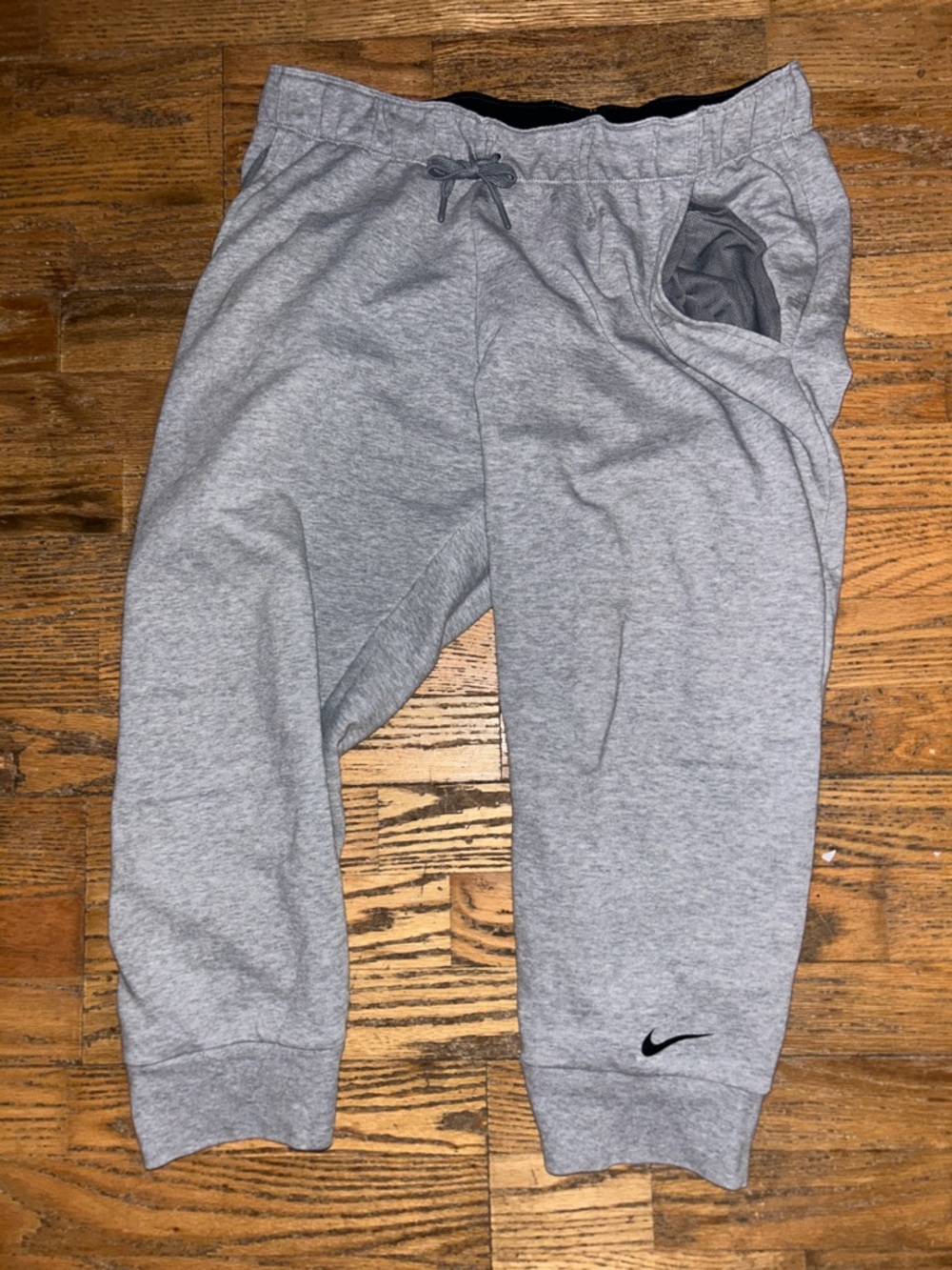 Nike men’s Gray Heather Jogger Sweatpants with Black Swoosh